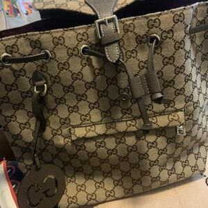 Authentic Gucci GG Monogram Canvas Drawstring Backpack – Soho Collection